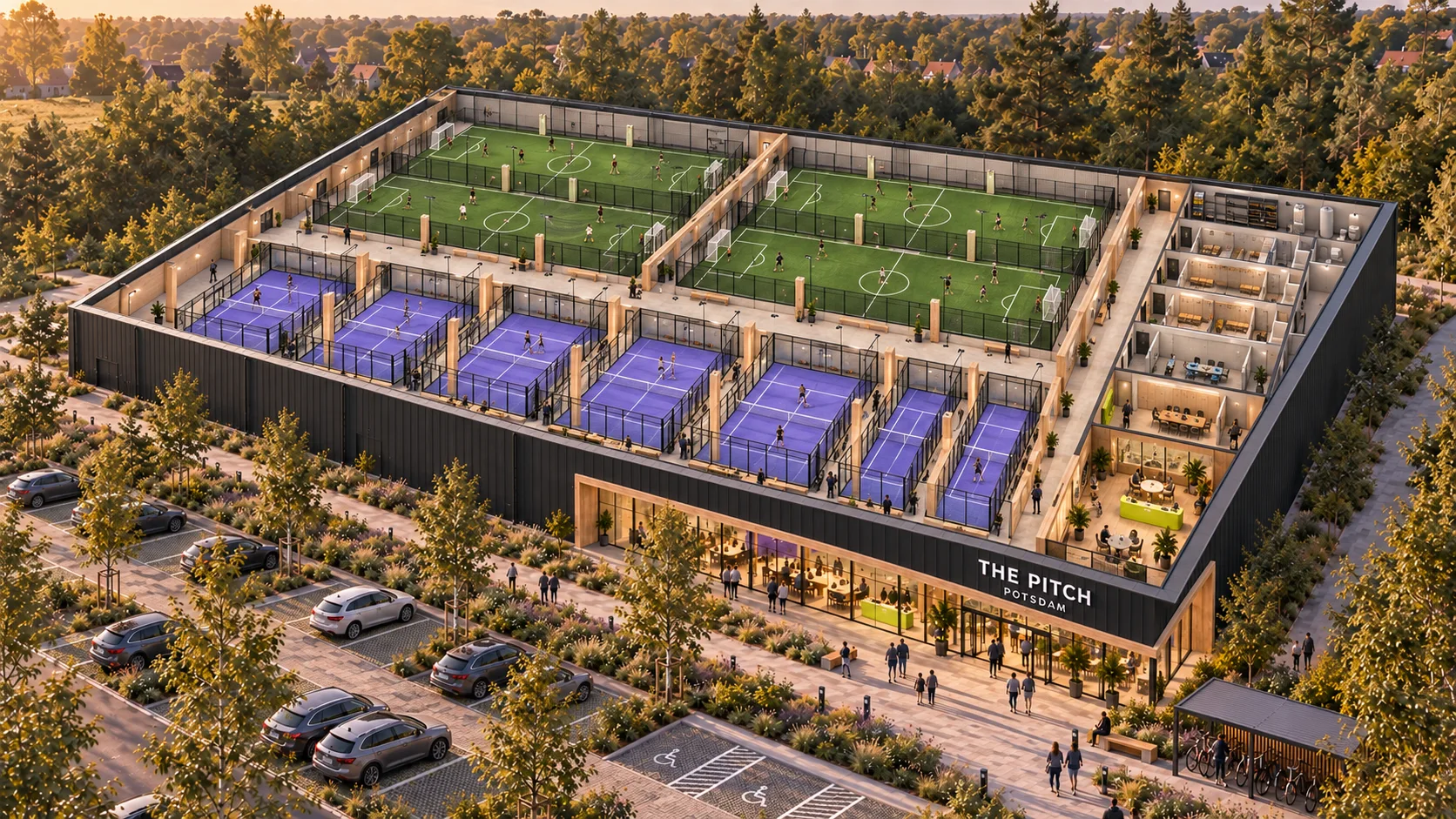 Geöffnetes Architekturmodell mit Fußballfeldern, Padel-Courts und den seitlichen Gemeinschaftsräumen